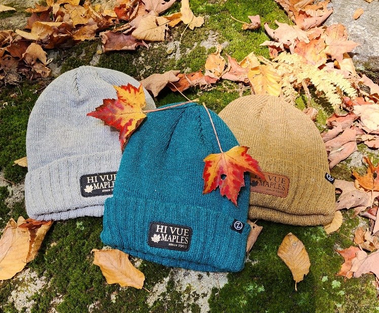 hats in fall leaves